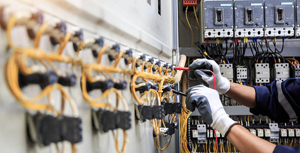 Professional Electrician technician working in Aurora, CO
